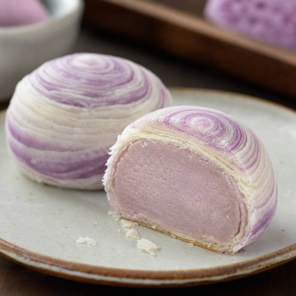 Flaky Teochew mooncake with a thousand-layer spiral crust and taro filling