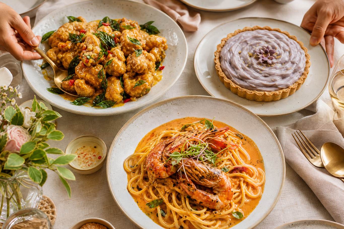 The three National Day fusion dishes plated to share: salted egg chicken, laksa prawn linguine and orh nee tart at D'Open Kitchen Singapore
