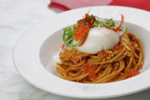 singapore chilli crab pasta with onsen egg and salmon roe