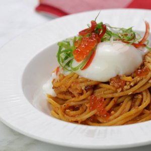 singapore chilli crab pasta with onsen egg and salmon roe