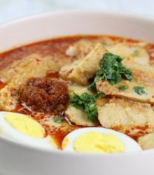 Bowl of Singapore Laksa made during Singapore cooking class